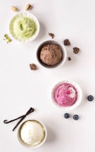 Healthy And Super Easy Homemade Ice Cream Ideas & Recipes image 2 top view of some simple ice cream flavours vanilla bean chocolate Frosted Fusions