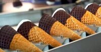 Which Ice Cream Waffle Cone Maker Is Right For You Image 7 Waffle ice cream cones lined up with tops dipped in chocolate Frosted Fusions