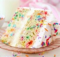 homemade-birthday-cake-ice-cream-recipe-image-4-slice-of-birthday-ice-cream-cake-showing-layers-and-sprinkles-frosted-fusions