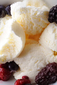 How Long Does Homemade Ice Cream Last In Your Freezer image 6 deliciously fresh scoops of vanilla ice cream with fresh berries frosted fusions