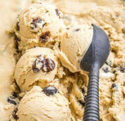 Decadent-Rum-and-Raisin-Ice-Cream-A-Boozy-Delight-image-4-399x560-jpeg-tray-of-rum-n-raisin-ice-cream-ice-cream-scoop-balling-scoop-of-r-n-r-ice-cream-frosted-fusions.jpg
