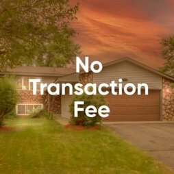 Suburban home exterior at sunset with bold white overlay text reading ‘No Transaction Fee.’