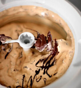 10 Common Homemade Ice Cream Problems And How To Fix Them image 4 ice cream in churner frosted fusions