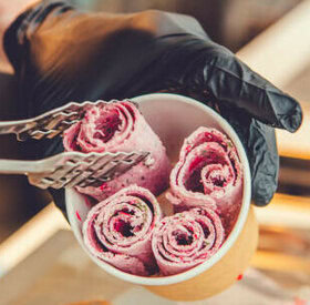 From Scoop To Roll Learn To Create Your Own Homemade Ice Cream Rolls image 2 four ice cream rolls placed in a cup frosted fusions