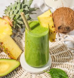 Revitalise-And-Refresh-The-Ultimate-Detox-Green-Smoothie-image-8-Green-smoothie-with-fresh-spinach-leaves-avocado-pineapple-and-coconut-frosted-fusions