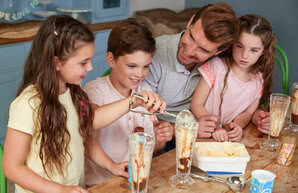 Learn To Make  Homemade Ice Cream A Beginners Guide image 8 family enjoying ice cream together frosted fusions