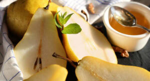 homemade-ice-cream-ideas-for-thanksgiving-image-4-pears-sliced-with-a-dish-of-maple-syrup-frosted-fusions