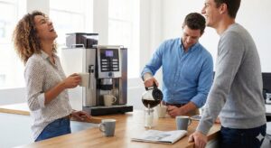 Office coffee machine in daily use in workplace kitchen
