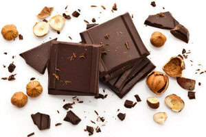 Learn To Make  Homemade Ice Cream A Beginners Guide image 6 chunks of chocolate and nuts scattered white background frosted fusions