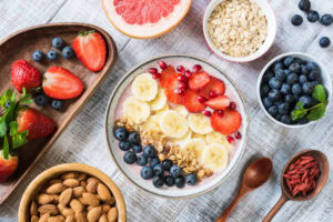Quick-EasyAnd-Deliciously-Healthy-Breakfast-Smoothie-Recipes-image-1-top-view-of-breakfast-smoothie-with-additional-ingredients-to-the-side-Frosted-Fusions
