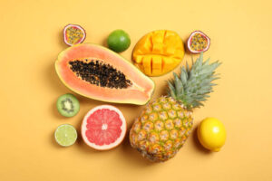 What-Smoothie-Is-Best-For-The-Immune-System-image-7-selection-of-immune-boosting-fruits-including-papaya-kiwi-mango-pineapple-Frosted-Fusions