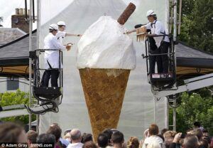 The Fascinating World of Ice Cream! image 2 jpeg largest ever ice cream cone with people on cherry pickers adding finishing touches frosted fusions
