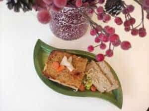 A Polish pasztet recipe on a green plate.