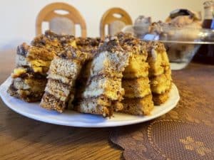A slice of miodownik cake on a plate.