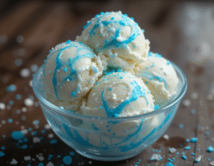 Minecraft-Inspired-Ice-Cream-Recipes-–-Scoops-From-The-Blocky-World-Image-6-Diamond-Ore-vanilla-and-blue-syrup-with-popping-candy-and-sprinkles-Frosted-Fusions