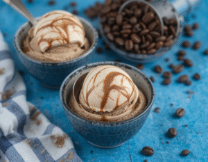 Fathers-Day-Ice-Cream-Treats-–-Cool-Gifts-For-The-Coolest-Dads-image-5-coffee-gelato-swirled-in-bowls-with-coffee-beans-scattered-Frosted-Fusions