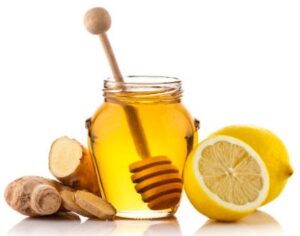 A-Not-So-Hot-Toddy-Homemade-Honey-Lemon-Ginger-Ice-Cream-image-2-jar-of-honey-whole-lemon-and-fresh-ginger-with-white-background-Frosted-Fusions