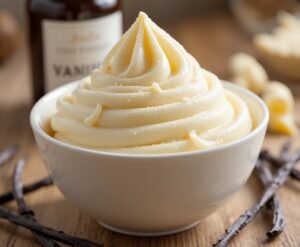 Savour-the-Creaminess-of-Classic-Vanilla-Bean-Frozen-Yoghurt-image-8 bowl of Vanilla bean froyo with fresh vanilla beans and vanilla extract to the side Frosted Fusions