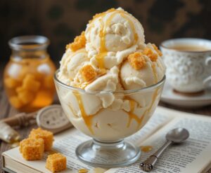 Dahl-licious-Scrumdiddlyumptious-Ice-Creams-Inspired-By-Roald-Dahl-image-6-Soft-vanilla-ice-cream-rippled-with-honeycomb-chunks-in-a-glass-tub-topped-with-honey-drizzles-Frosted-Fusions