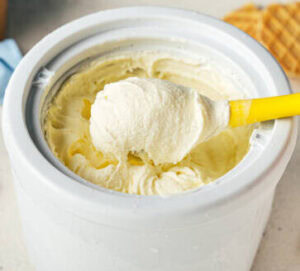 10 Common Homemade Ice Cream Problems And How To Fix Them image 5 ice cream in freezer bowl being scooped frosted fusions