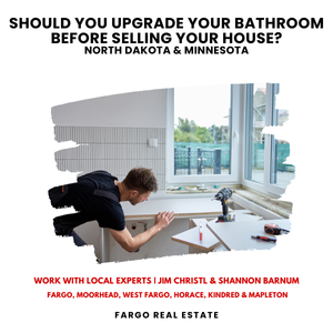 Homeowner measuring bathroom window during renovation planning before selling a house in Fargo ND and Moorhead MN