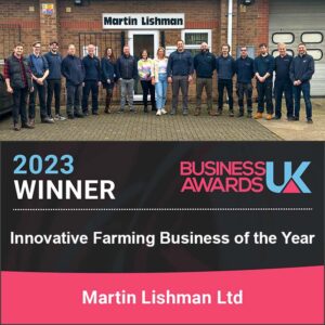 Innovative Farming Business Martin Lishman team stands outside of the company building.