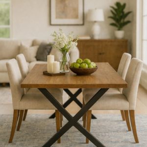 Solid Oak dining table with black powder-coated metal legs by the Mensa Table Company in a modern dining room