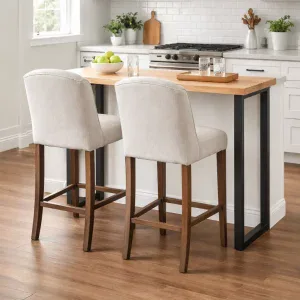Modern kitchen with light Swedish pine wood breakfast bar featuring black metal legs and two Ashby grey upholstered beige bar stools.