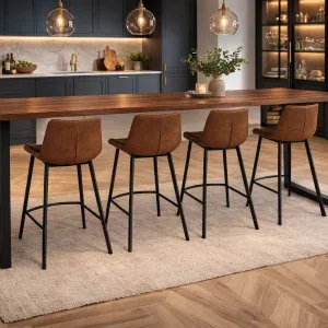 Luxury kitchen featuring a 200cm walnut breakfast bar with black U-shaped metal legs and four soho tan leather bar stools.