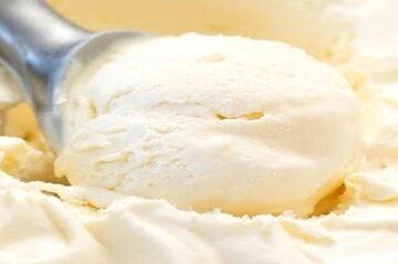 How-to-Make-Homemade-Ice-Cream-Without-an-Ice-Cream-Maker-featured-image-632x2000w-jpeg-vanilla-ice-cream-in-tray-being-balled-with-ice-cream-scoop-frosted-fusions