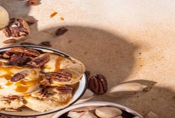 Easy-Homemade-Brown-Butter-Pecan-Ice-Cream-featured-image-207x620w-cropped-bowl-of-brown-butter-pecan-ice-cream-with-caramel-sauce-drizzled-silver-scoop-and-nuts-scattered-frosted-fusions