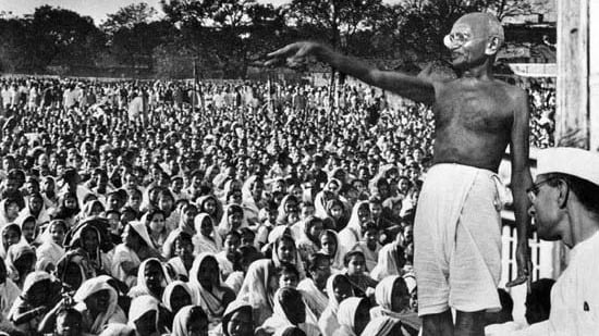 a man standing in front of a crowd of people
