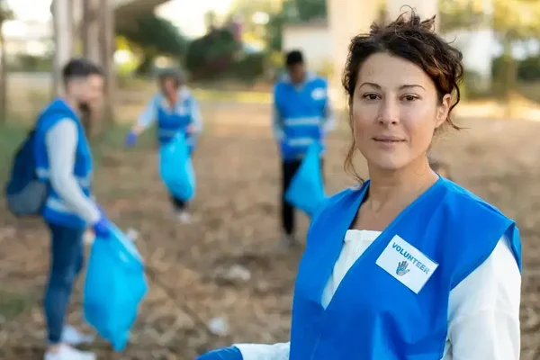 Volunteers unite in a cleanup event, promoting teamwork for a cleaner, greener community.