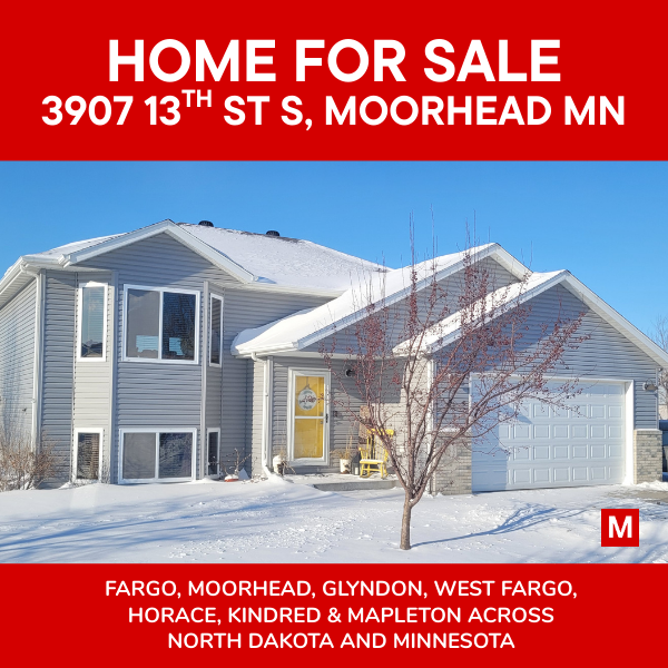 &ldquo;Home for sale at 3907 13th St S in Moorhead, Minnesota &mdash; a gray bi-level house with attached two-stall garage, snow-covered front yard, clear blue winter sky, and red Modern Market REALTORS&reg; &lsquo;Home for Sale&rsquo; banner.&rdquo;
