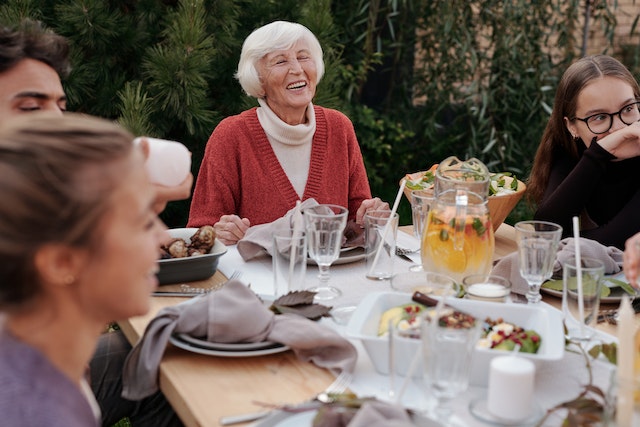 family-gathered-around-dinner-table-eating