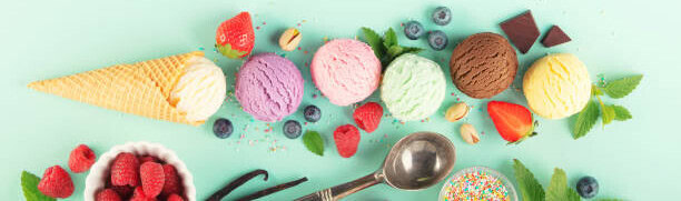 The Ice Cream And Sugar Debate image 7 ice cream cone with several scoops of ice cream lined up with fresh fruits scattered frosted fusions