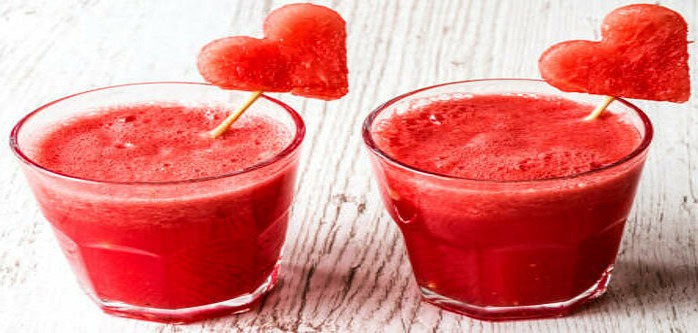 how-to-make-the-perfect-smoothie-image-13-two-red-smoothies-in-glasses-with-fruit-cut-out-in-heart-shapes-frosted-fusions