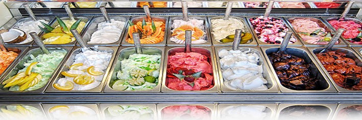 Gelato-vs-Ice-Cream-Isnt-it-the-same-thing-featured-image-200x600w-selection-of-gelatos-lined-up-in-large-display-trays-frosted-fusions