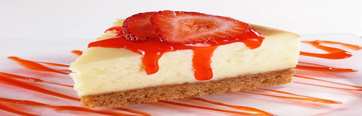 Homemade-Strawberry-Cheesecake-Ice-Cream-Recipe-featured-image-200x620w-slice-of-strawberry-cheesecake-fresh-sliced-strawberries-with-strawberry-sauce-drizzled-frosted-fusions