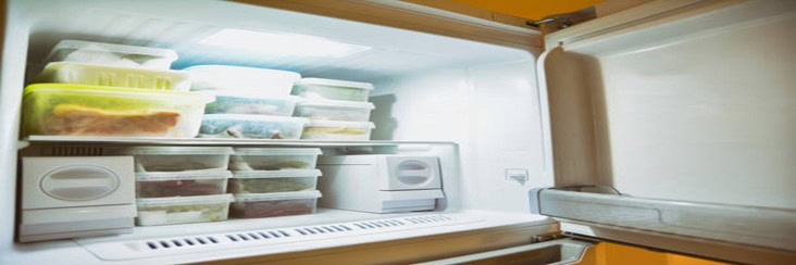 How-Long-Does-Homemade-Ice-Cream-Last-In-Your-Freezer-featured-image-207x620w-several-food-storage-containers-stacked-in-an-open-freezer-frosted-fusions