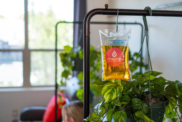 An IV infusion therapy bag with yellow vitamin fluid hangs at Virasoap Natural Medicine in Meridian Boise Idaho