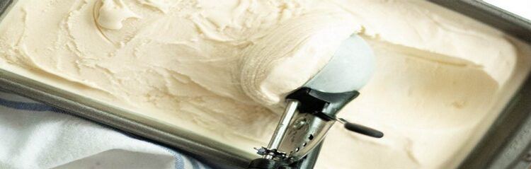 How-to-make-Delicious-Indulgent-Homemade-Ice-Cream-featured-image-2000x632w-vanilla-ice-cream-in-tray-being-balled-with-silver-ice-cream-scoop-frosted-fusions