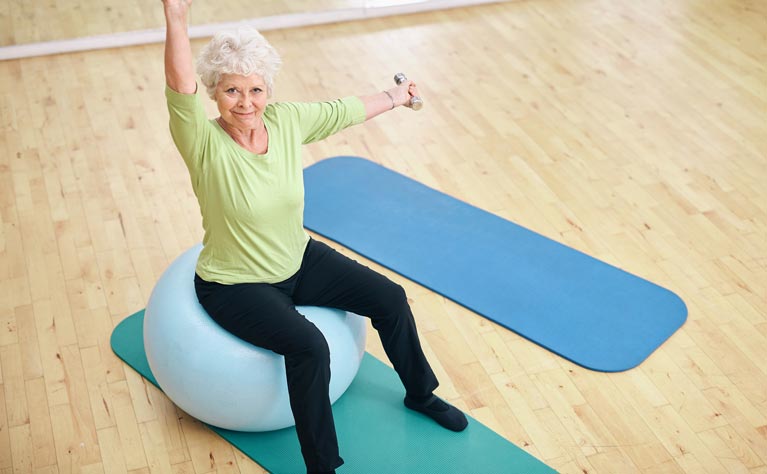 Senior woman doing pilates