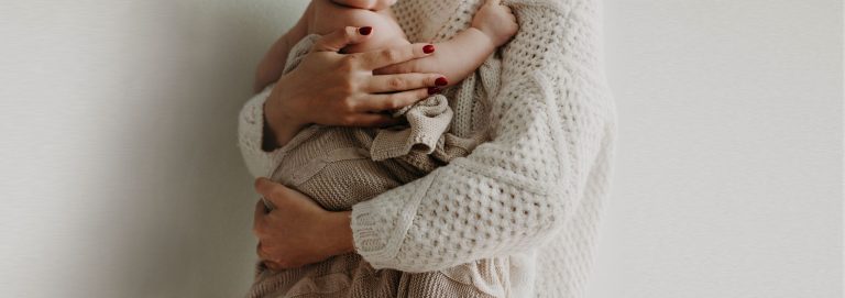 photo-of-a-mom-holding-her-newborn-300x200