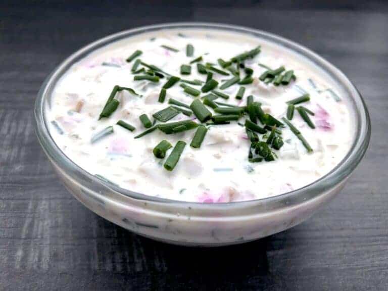 A quick and easy Polish Sos Tatarski recipe ready in 5 minutes, topped with sour cream and chives.