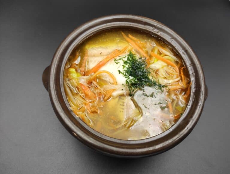 A bowl of carrot soup with noodles, Polish cuisine.