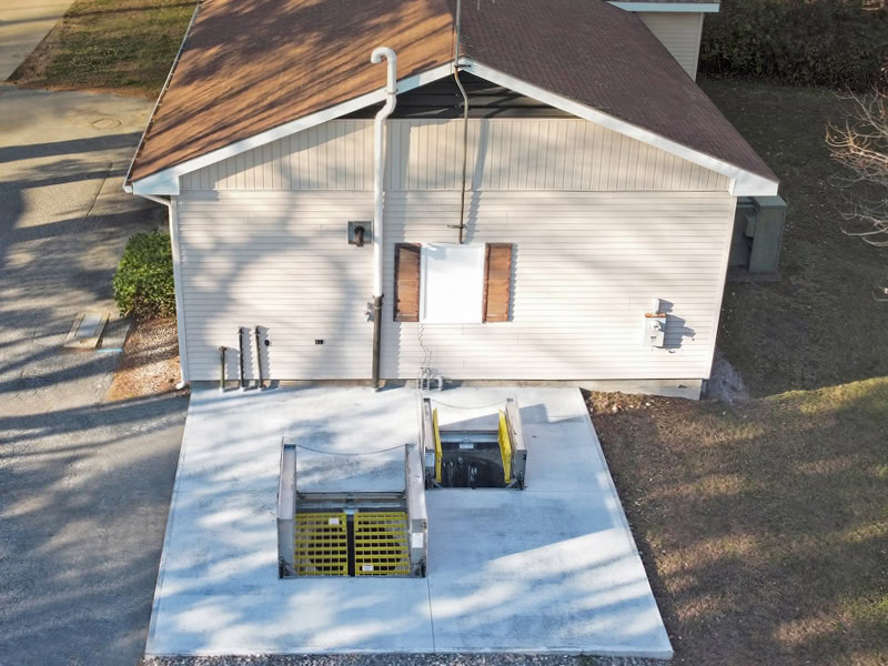 BILCO floor doors with fall protection grating at water treatment stations in Waterford, Connecticut.