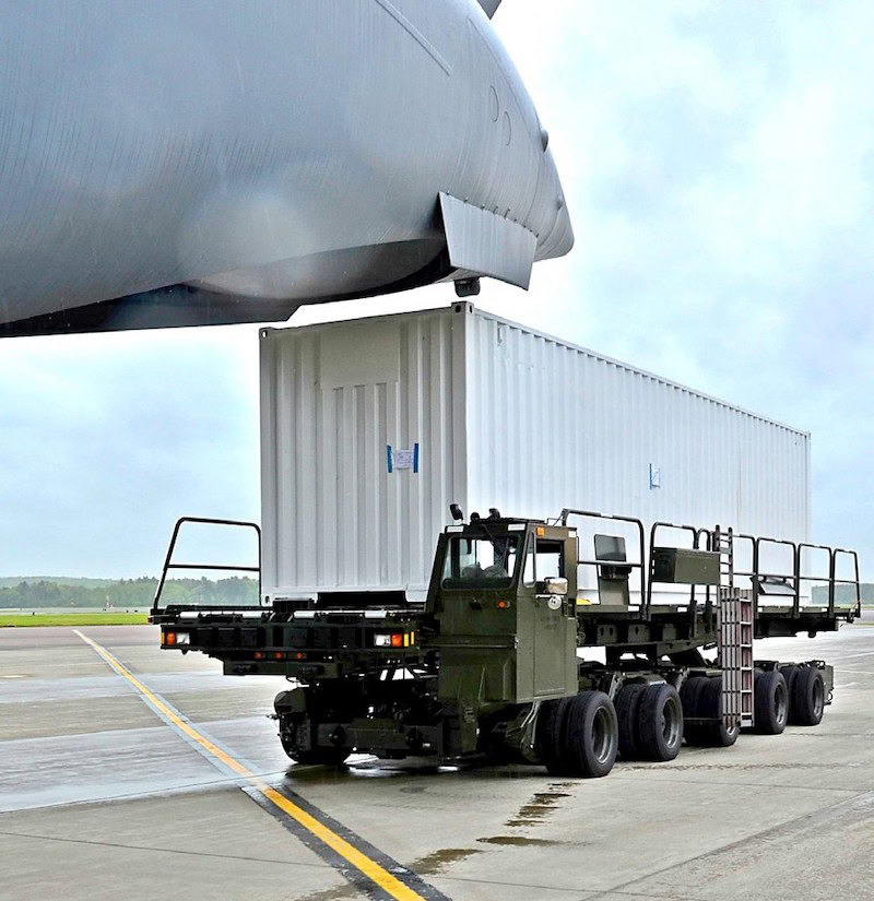 Australian Airforce C-17 unloading shipping container from Maine, USA.
