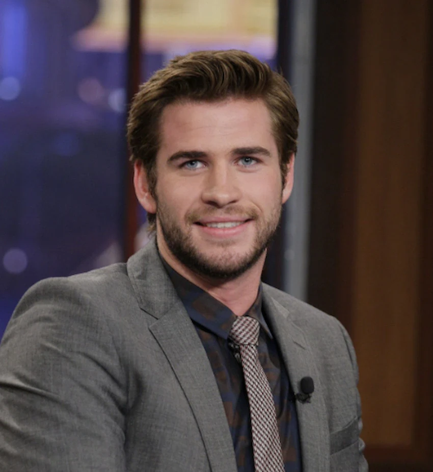 dents de Liam Hemsworth en 2013
