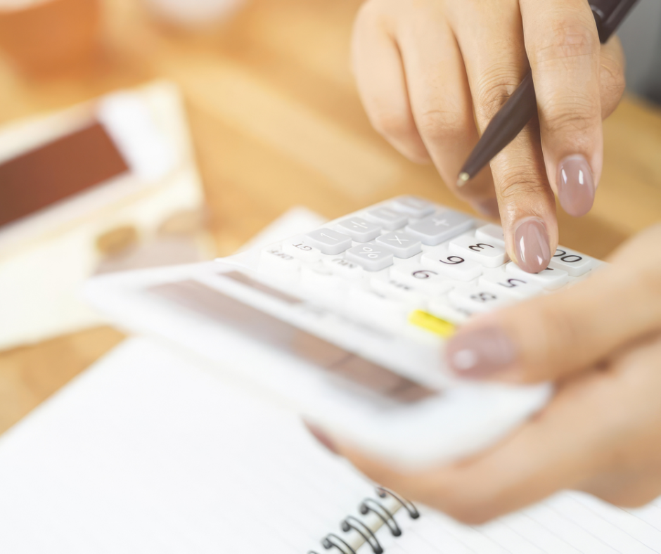 Person using a calculator to estimate estate planning costs in Florida
